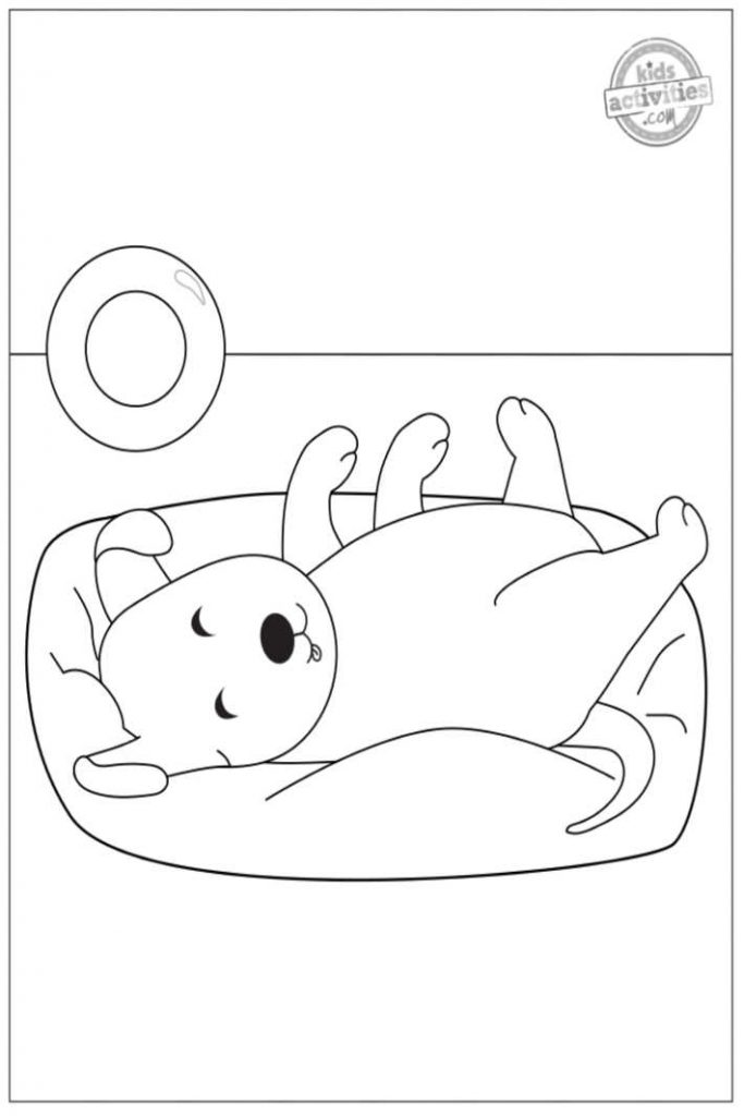 coloriages gratuits de chiot #2 - chiot mignon allongé sur le dos dans un lit de chien pdf illustré sous forme imprimable