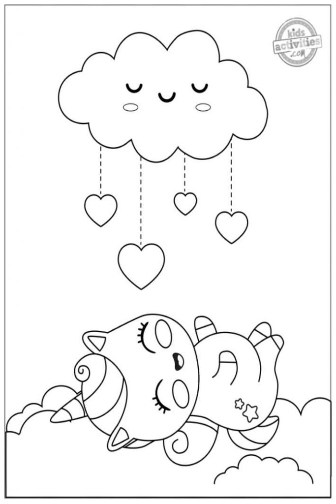 coloriages bébé licorne - pdf imprimé d'une licorne allongée sur le dos sous un nuage de coeurs image pour les enfants à colorier