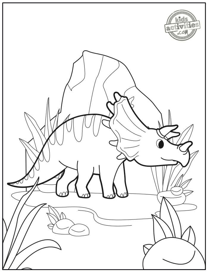 coloriage bébé tricératops imprimé pdf illustré avec bébé dinosaure devant un rocher - Blog activités enfants