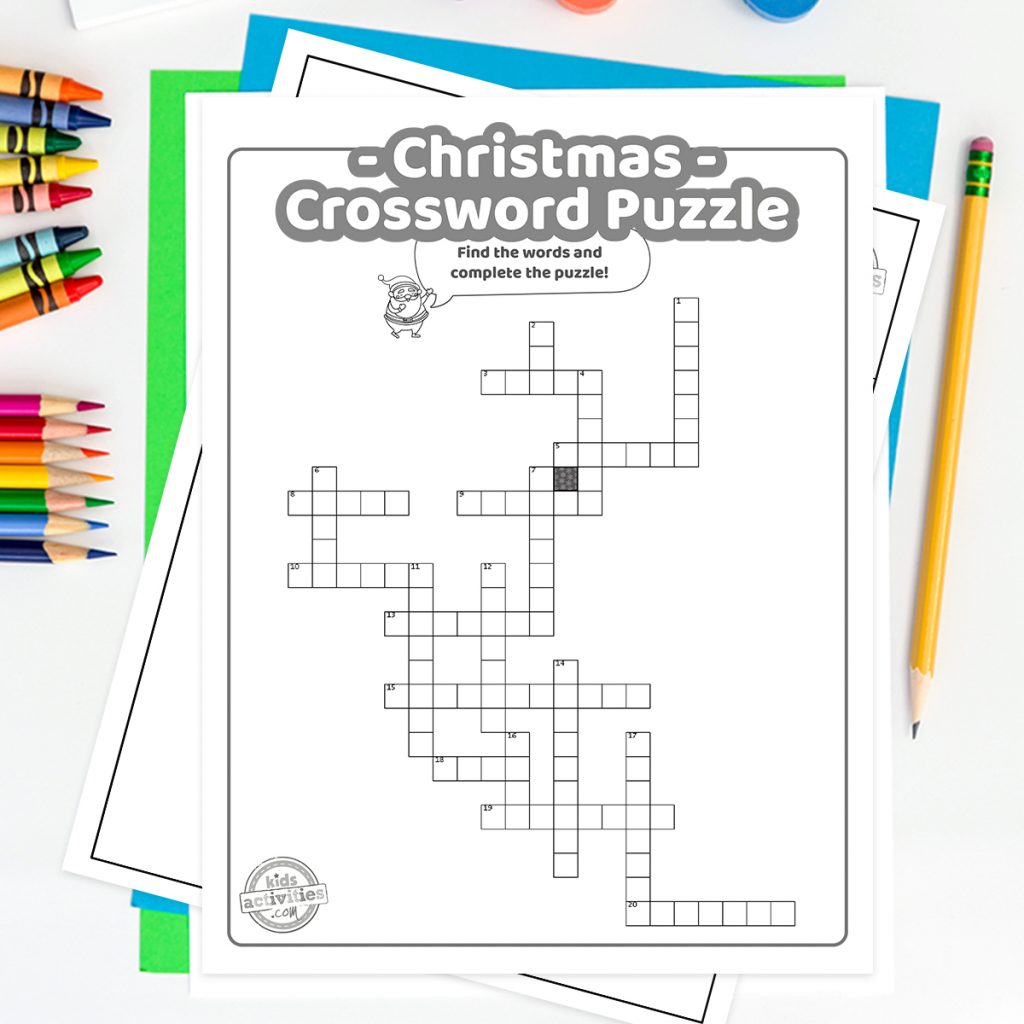 Mots croisés de Noël affichés sur un tableau blanc avec un crayon - Kids Activities Blog